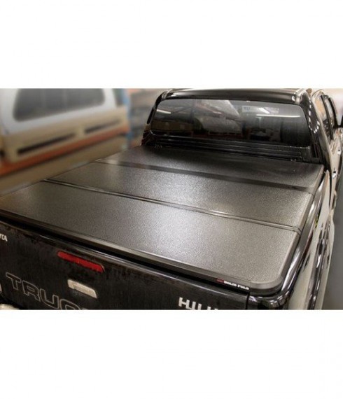 Трехсекционная крышка Toyota Hilux 2015+ Extang модель Solid Fold фото