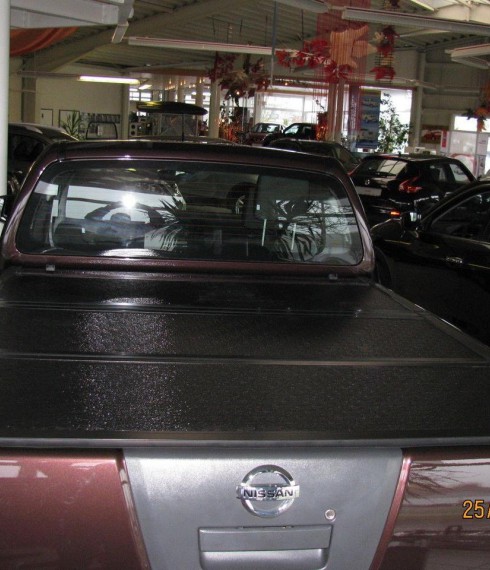 Крышка кузова из трех секций Nissan Navara 2005-2015 Undercover фото