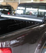 Крышка кузова из трех секций Nissan Navara 2005-2015 Undercover фото