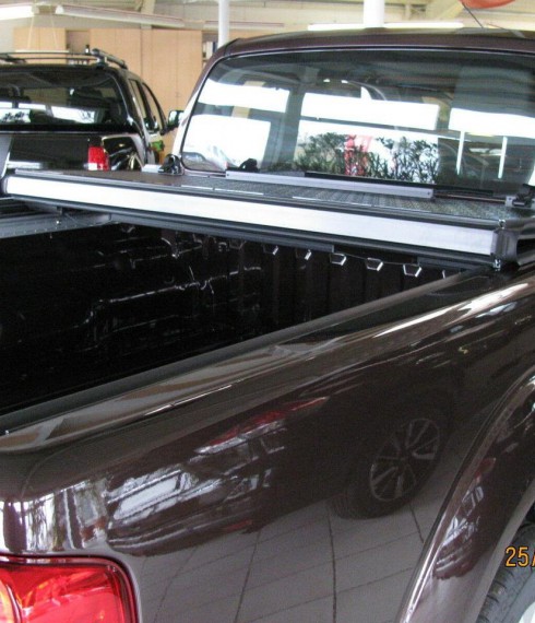 Крышка кузова из трех секций Nissan Navara 2005-2015 Undercover фото
