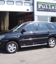 Подножки для KIA Sportege 04-10 порог трубой от Tamsan фото