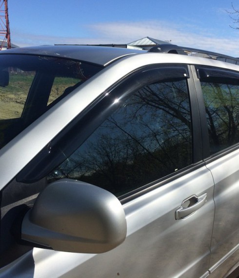 Дефлекторы окон ветровики для SsangYong Kyron 2007+ фото