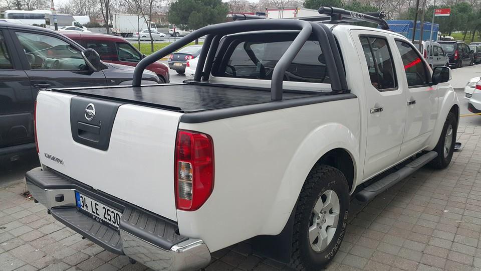 Ролета на Nissan Navara 2006-2015 под Roll-Bar Arline фото
