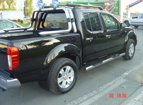 Подножки для Nissan Navara 2006-2015 порог трубой от Tamsan фото