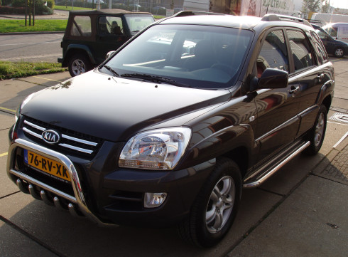 Подножки для KIA Sportege 04-10 порог листом от Tamsan фото