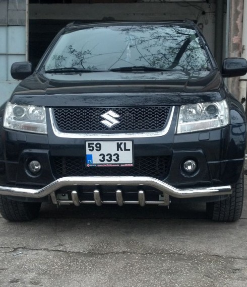 Труба одинарная с грилем на Suzuki Grand Vitara фото