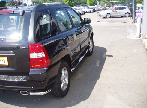 Подножки для KIA Sportege 04-10 порог трубой от Tamsan фото
